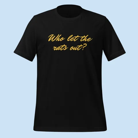 Black tee with "Who let the rats out?" hand-signed across the chest